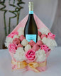 Pink Belgian chocolate-covered strawberry bouquets and a bottle of exclusive