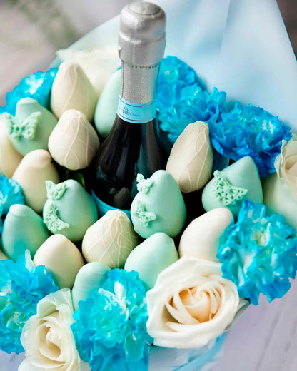 Blue Belgian chocolate-covered strawberry bouquets and a bottle of exclusive